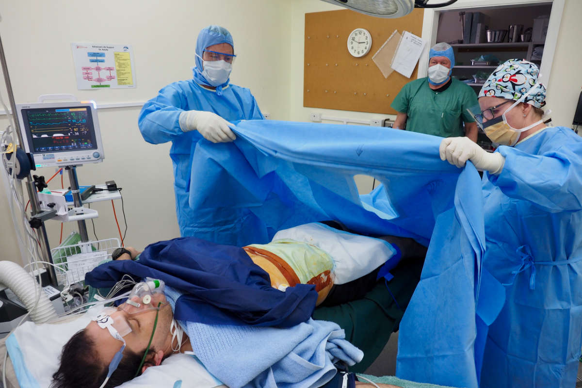 View of medical team at work in operating theatre. Photo: Australian Antarctic Division.