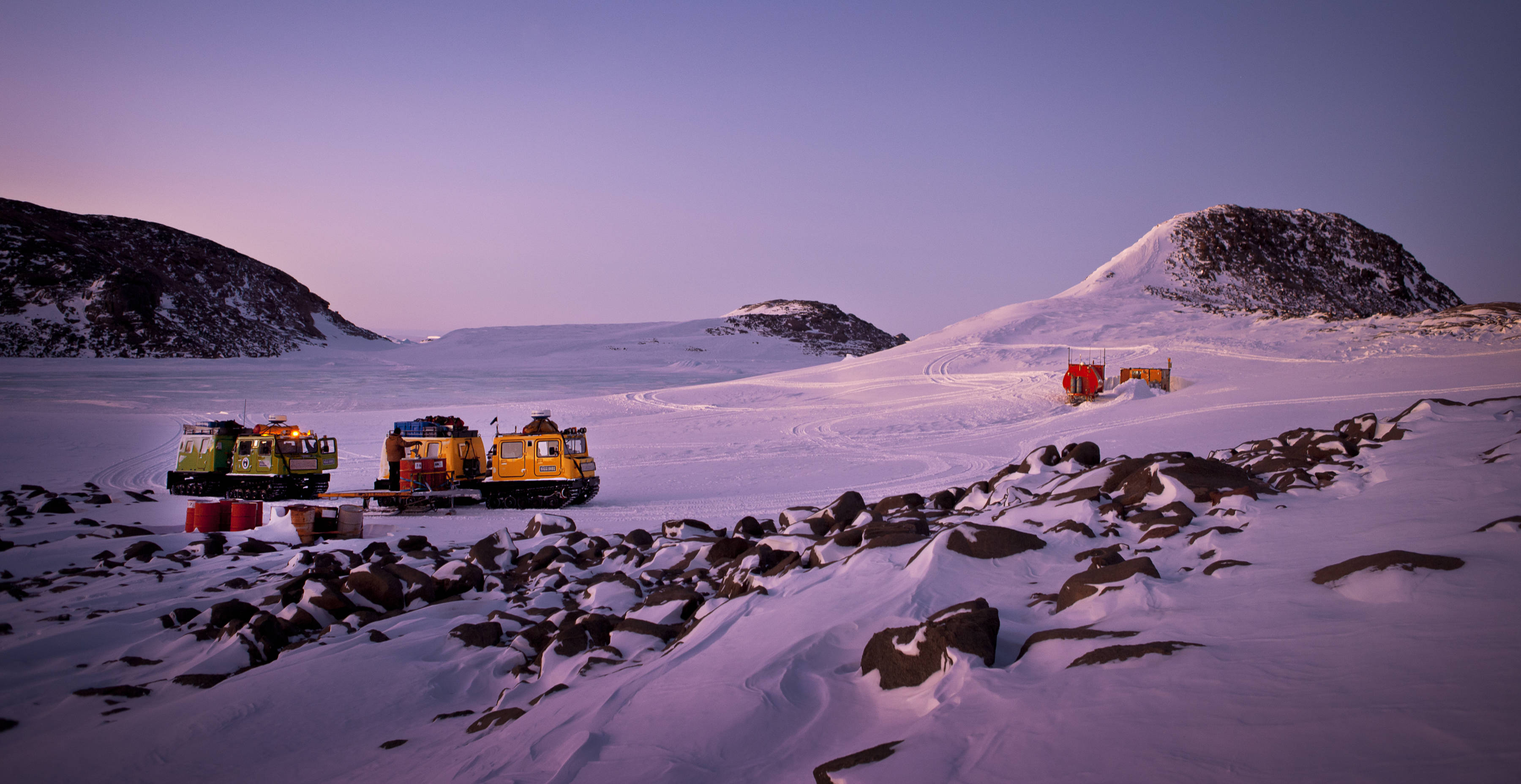 Over-snow tracked vehicles, Hagglunds, at a field hut in the Vestfold Hills, near Davis research station. Photo: Chris Wilson.